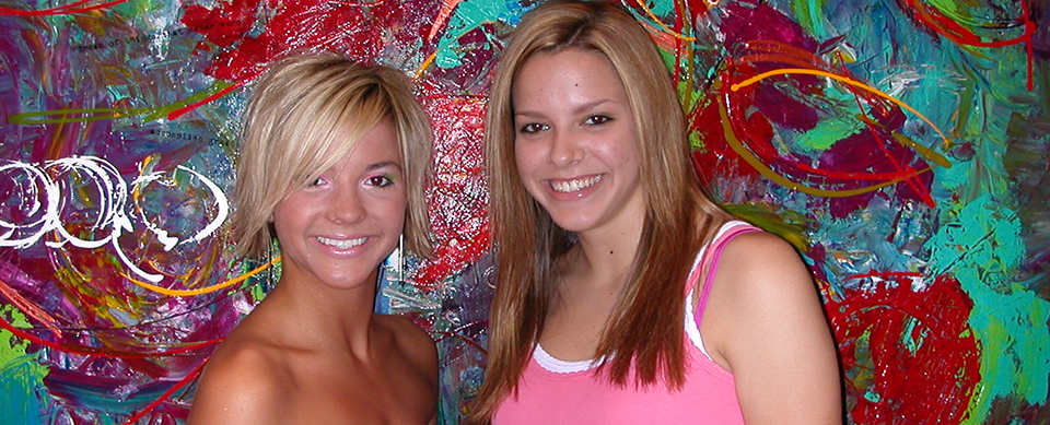 Two Girls Smiling at Dr. Michael LaCorte's Dental Practice Serving Tucson, Oro Valley and Marana, AZ